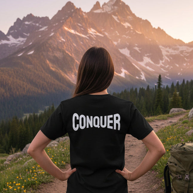 CONQUER— Overcome The Obstacles | Rebel Light House On Demand Graphic Tee